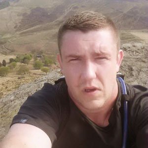 Ste taking a picture with Tameside behind him